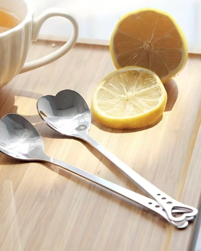 Starlight Express silver heart handle spoon for kitchen and dining, featuring a decorative heart-shaped handle and polished metal finish.