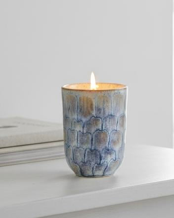 Navy blue tall ceramic candle from Heaven Sends, elegant pillar-style candle in a sleek ceramic holder.