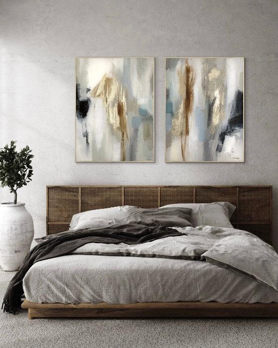 Bedroom with abstract wall art above a bed