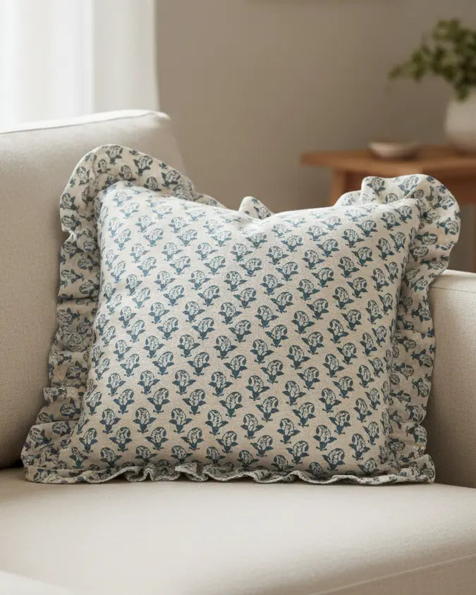 Blue Lulah block printed ruffle cushion cover by Riva Home, featuring soft fabric and decorative ruffle details.