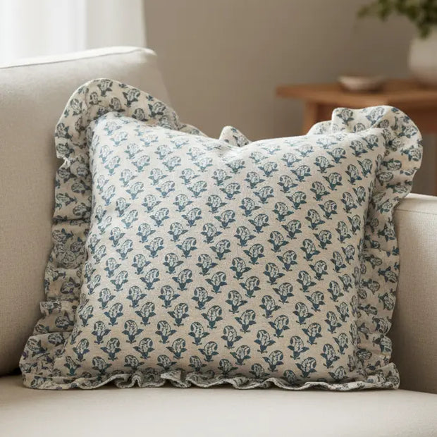 Blue Lulah block printed ruffle cushion cover by Riva Home, featuring soft fabric and decorative ruffle details.
