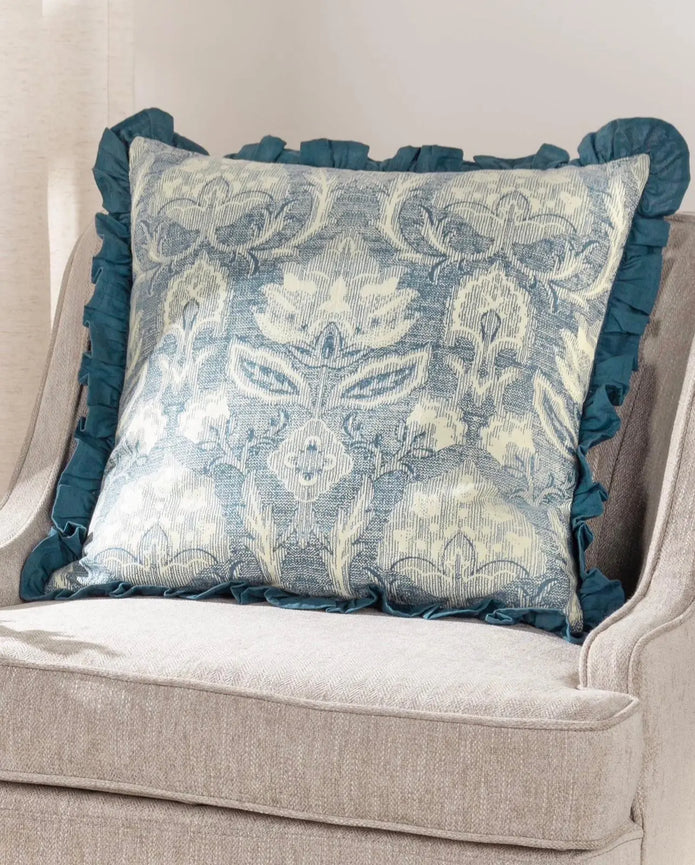 Blue Kirkton floral pleat fringe cushion cover by Riva Home, showcasing soft furnishings with floral fabric and decorative fringe detail.