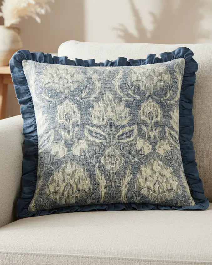 Blue Kirkton floral pleat fringe cushion cover from Riva Home, soft furnishings with floral design and textured pleats.