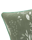 Olive green Fearne printed velvet cushion cover by Riva Home, showcasing soft furnishings with floral pattern and textured fabric.