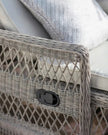 Natural Rattan Menton outdoor lounger by Gallery Direct, showcasing a stylish garden furniture piece with a woven rattan design.