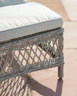 Natural rattan Menton outdoor lounger from Gallery Direct, garden furniture with cushioned seating and stylish design.