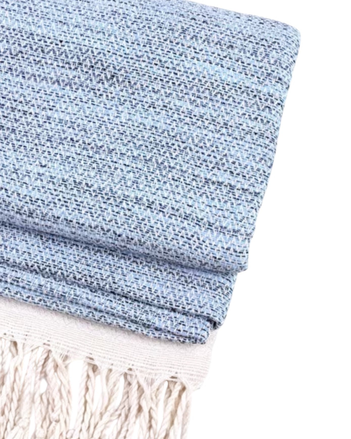 Blue and neutral diamond stitch Hammam-style throw blanket from Starlight Express, showcasing soft, textured woven fabric.