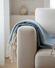 Blue and neutral diamond stitch hammam-style throw blanket from Starlight Express, soft and textured for cozy home decor.
