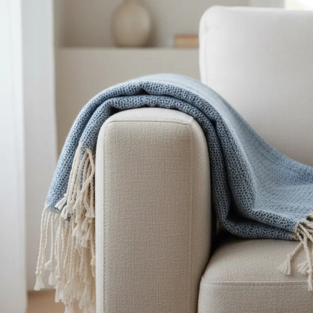 Blue and neutral diamond stitch hammam-style throw blanket from Starlight Express, soft and textured for cozy home decor.