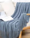 Ocean blue diamond pattern knitted throw blanket by Starlight Express, soft furnishings with cozy textured design.