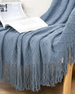 Ocean blue diamond pattern knitted throw blanket by Starlight Express, soft furnishings with cozy, textured knit design.