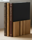 Wooden chopping board book set with stand by Starlight Express, perfect for kitchen and dining use with rustic wooden design.