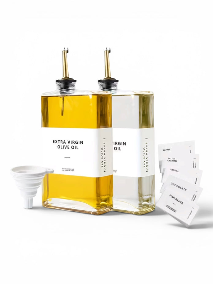 Gold glass dispenser bottles with pourers and labels, ideal for kitchen and dining storage by Starlight Express.