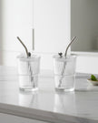 Ribbed glass travel coffee mug by Starlight Express, short size, with a clear ribbed design for kitchen and dining use.