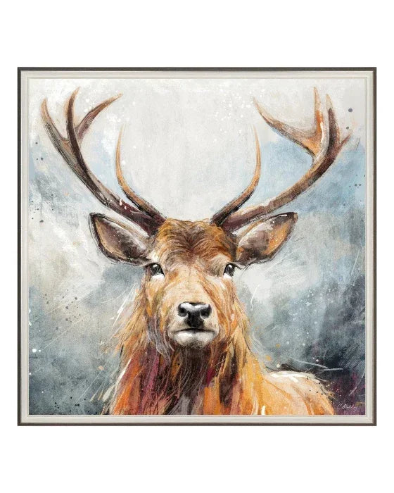 Framed artwork of a deer with large antlers against a snowy background