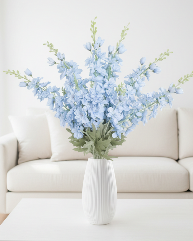Artificial tall ocean blue lupin flower stem from Starlight Express, showcasing vibrant blue, realistic flower details, and greenery.