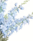 Artificial tall ocean blue lupin flower stem from Starlight Express, showcasing vibrant blue blossoms and green foliage.