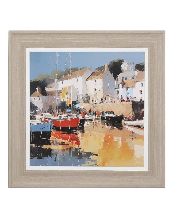 Framed artwork of a coastal scene with boats and buildings.