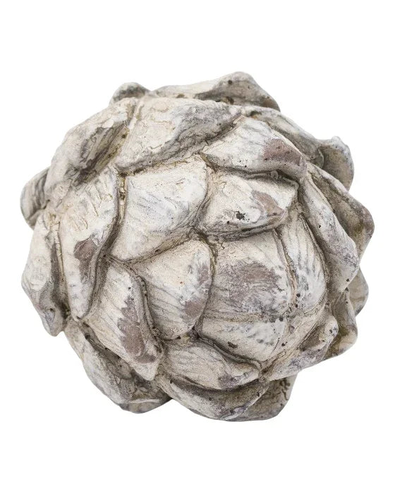 Decorative stone artichoke on a white background
