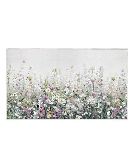 Framed artwork of a colorful floral field on a white background
