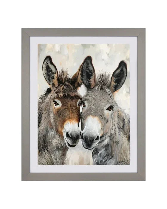 Framed artwork of two donkeys on a white background