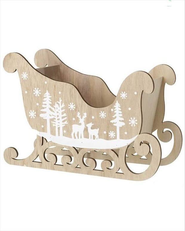 Wooden sleigh with winter scene design on a white background