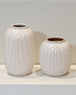 White ceramic vase with trailing leaf print, ideal for home decor, by Satchville.