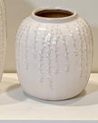 White ceramic vase with trailing leaf print, ideal for home decor, by Satchville, featuring a sleek, modern design for stylish interiors.