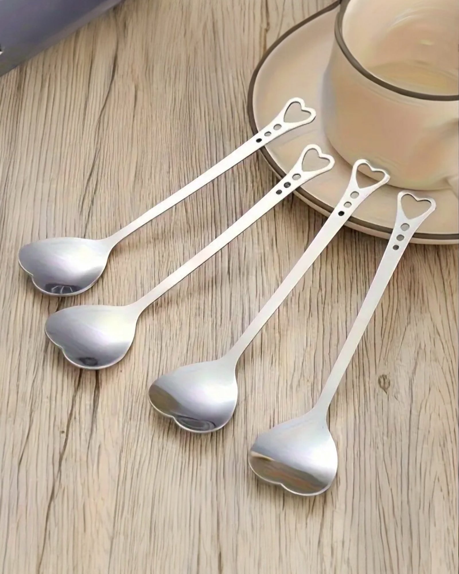 Silver Heart Handle Spoon from Starlight Express, a stylish kitchen and dining utensil with a heart-shaped handle.