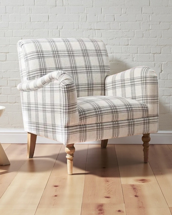 Starlight Express neutral checked arm chair with wooden legs, upholstered fabric, and a modern, comfortable design.