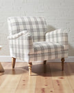 Starlight Express neutral checked arm chair with wooden legs, upholstered fabric, and a modern, comfortable design.