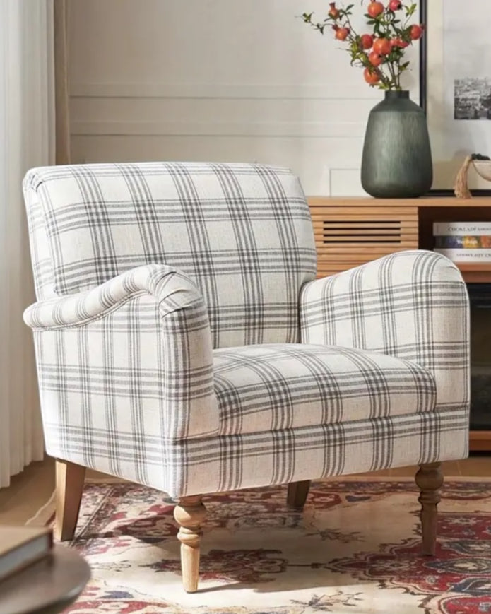 Starlight Express neutral checked arm chair with wooden legs, showcasing a cozy, modern furniture piece ideal for living rooms.