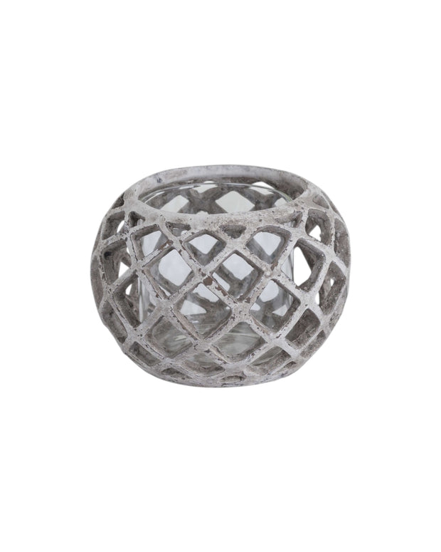 Large round ceramic lattice hurricane lantern for home decor by Hill Interiors, featuring intricate cut-out designs and a candle holder interior.