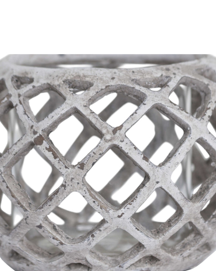 Large round ceramic lattice hurricane lantern, decorative home decor piece with intricate cut-out design.