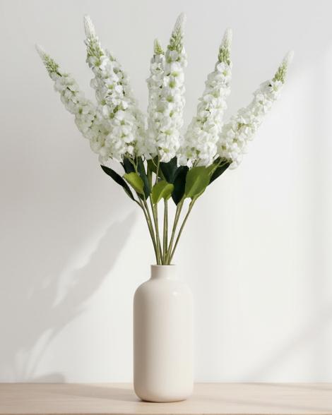 Artificial tall white lupin stem from Starlight Express, showcasing vibrant white flowers and green foliage for decorative indoor use.