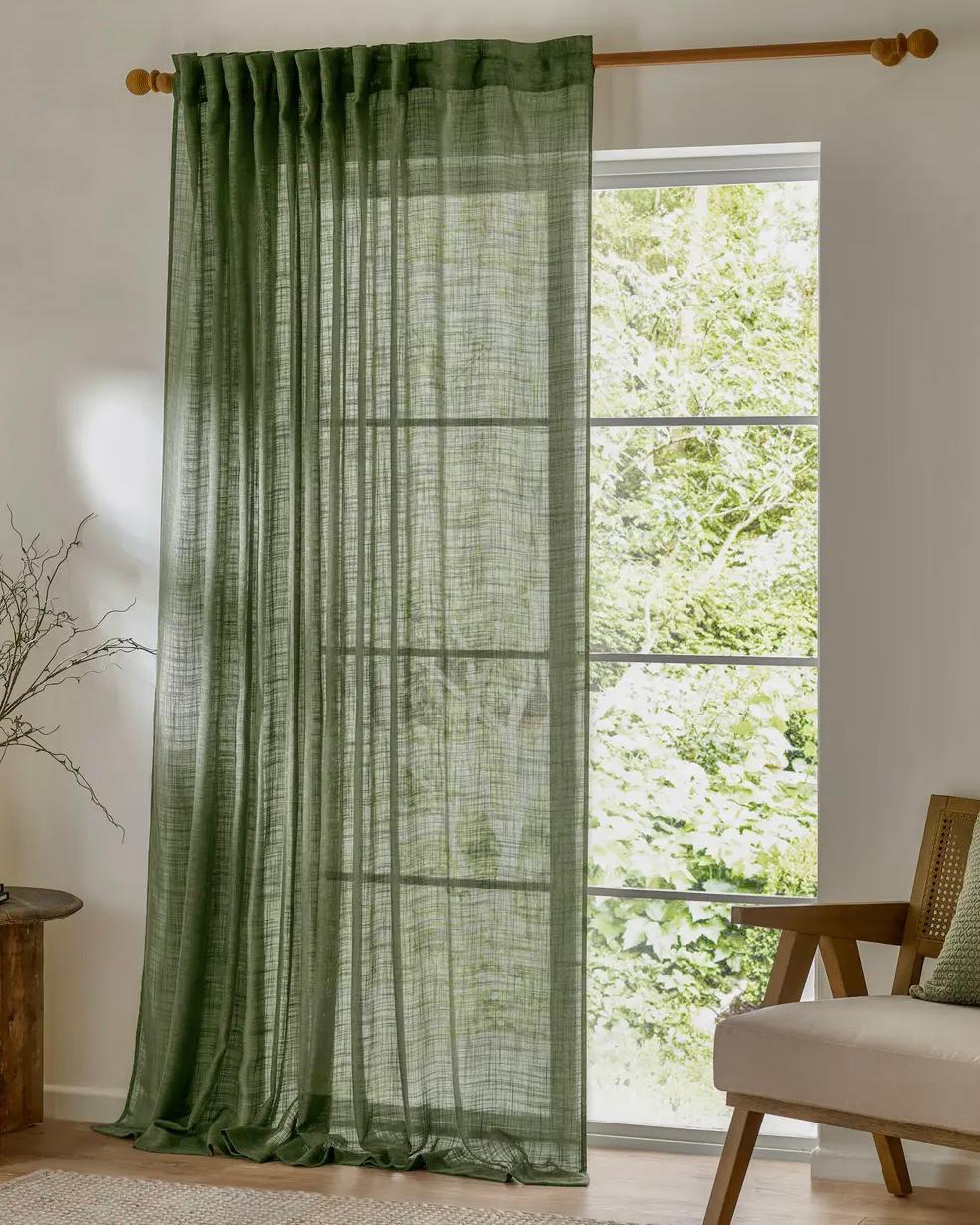 Olive green woven sheer voile curtain panel by Riva Home, soft furnishings, hanging fabric with a light, airy texture.