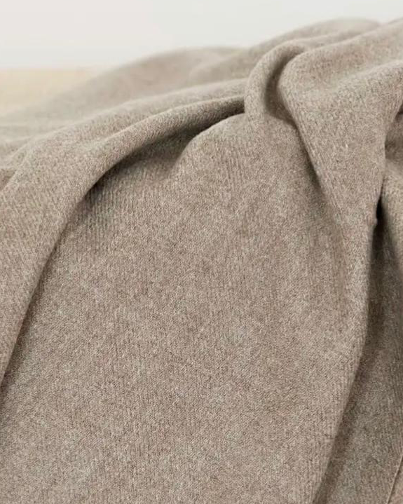 Beige and brown fine knit tasseled throw blanket from Ellenvale Trade, soft furnishings with fringed edges and cozy texture.
