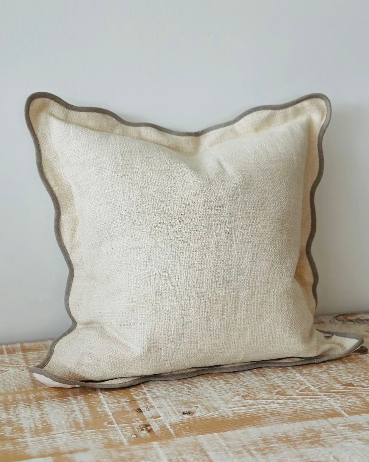 Cream and greige square scalloped cushion cover by Ellenvale Trade, soft furnishings with elegant scalloped edges.