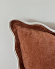 Rust brown and cream scalloped cushion cover by Ellenvale Trade, soft furnishings with decorative scalloped edges.