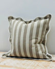 Beige square cushion cover with stripe and scalloped edges, soft furnishings by Ellenvale Trade, shown on a decorative pillow.