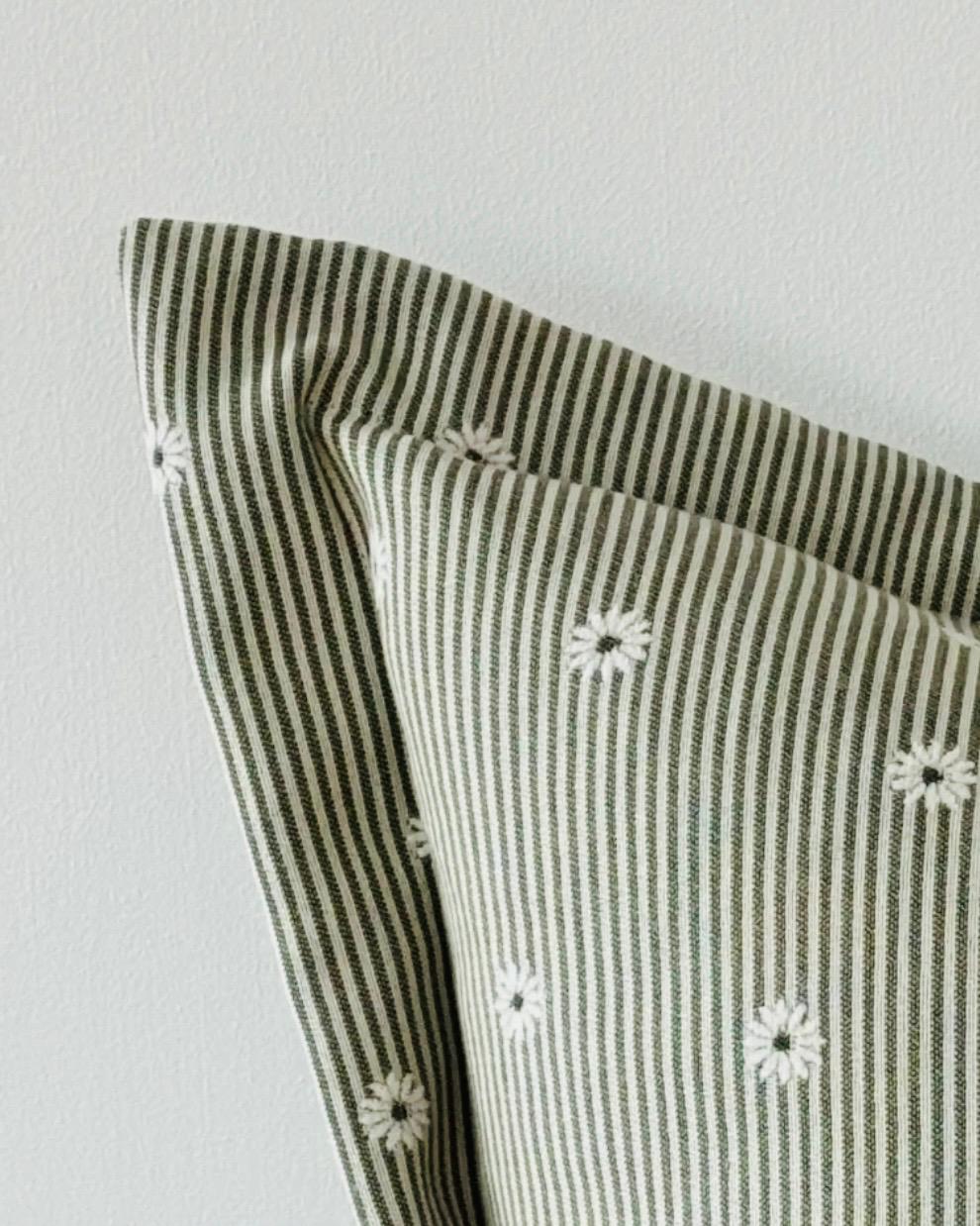 Olive green square cushion cover by Ellenvale Trade with a soft, textured fabric, perfect for decorative living room accents.