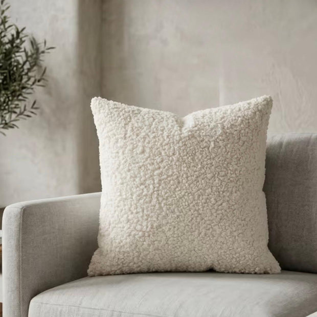 Cream boucle cushion cover from Starlight Express, soft and textured throw pillow for cozy home decor.