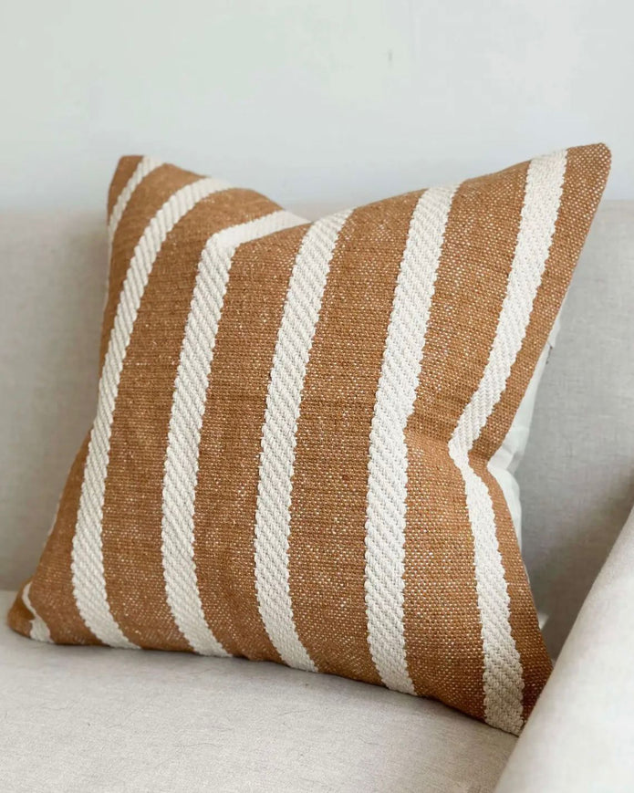 Rust brown and white wide stripe cotton cushion cover by Ellenvale Trade, showcasing soft furnishings with a stylish design.