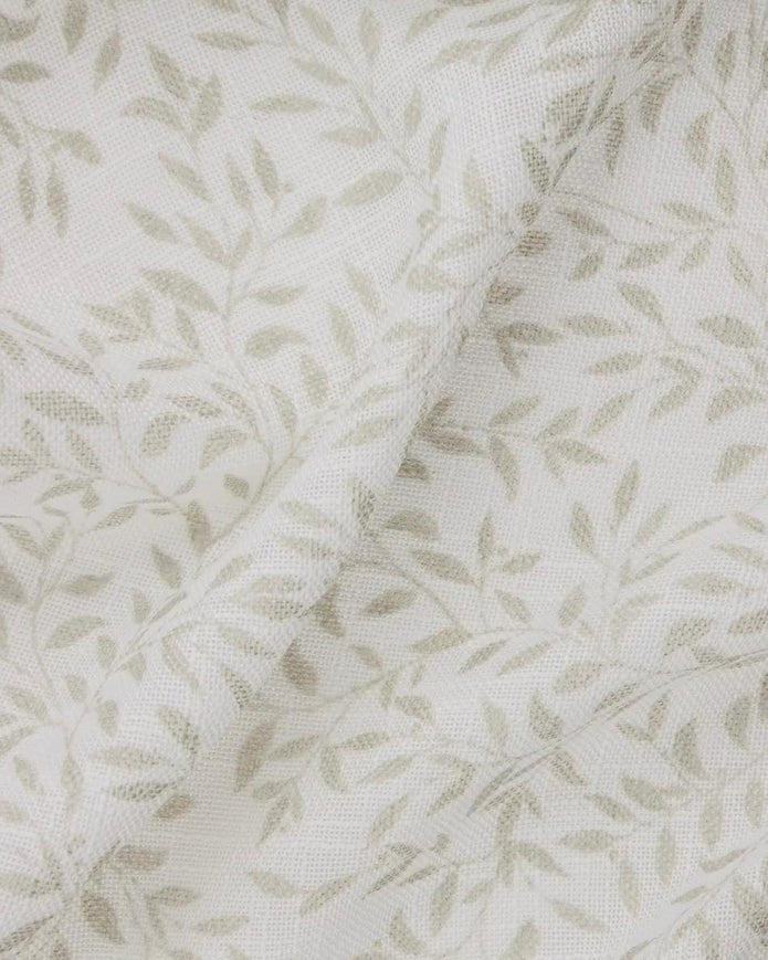 Riva Home yard leaf patterned natural woven sheer voile curtain panel hanging with soft, flowing fabric for home decor.