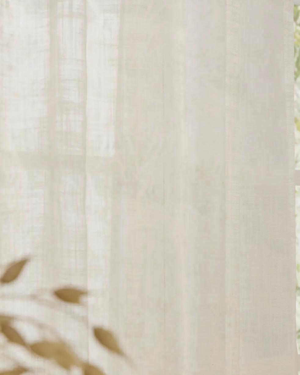 White woven sheer voile curtain panel by Riva Home, lightweight and soft, perfect for elegant window soft furnishings.
