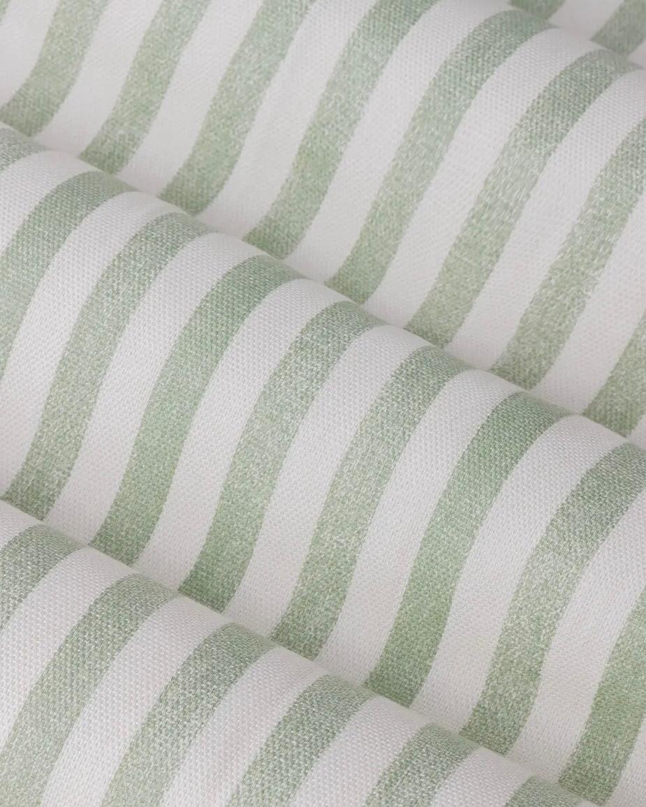 Sage green and black striped blackout eyelet curtains from Riva Home, soft furnishings with eyelet top for easy hanging.