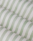 Sage green and black striped blackout eyelet curtains from Riva Home, soft furnishings with eyelet top for easy hanging.