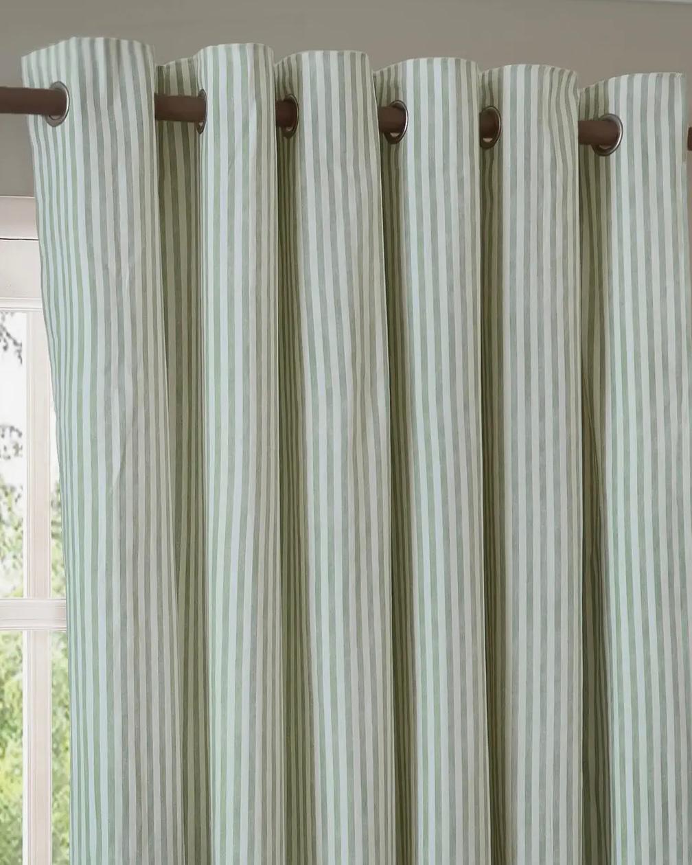Sage green and black striped blackout eyelet curtains from Riva Home, soft furnishings with eyelet top design for bedroom or living room.