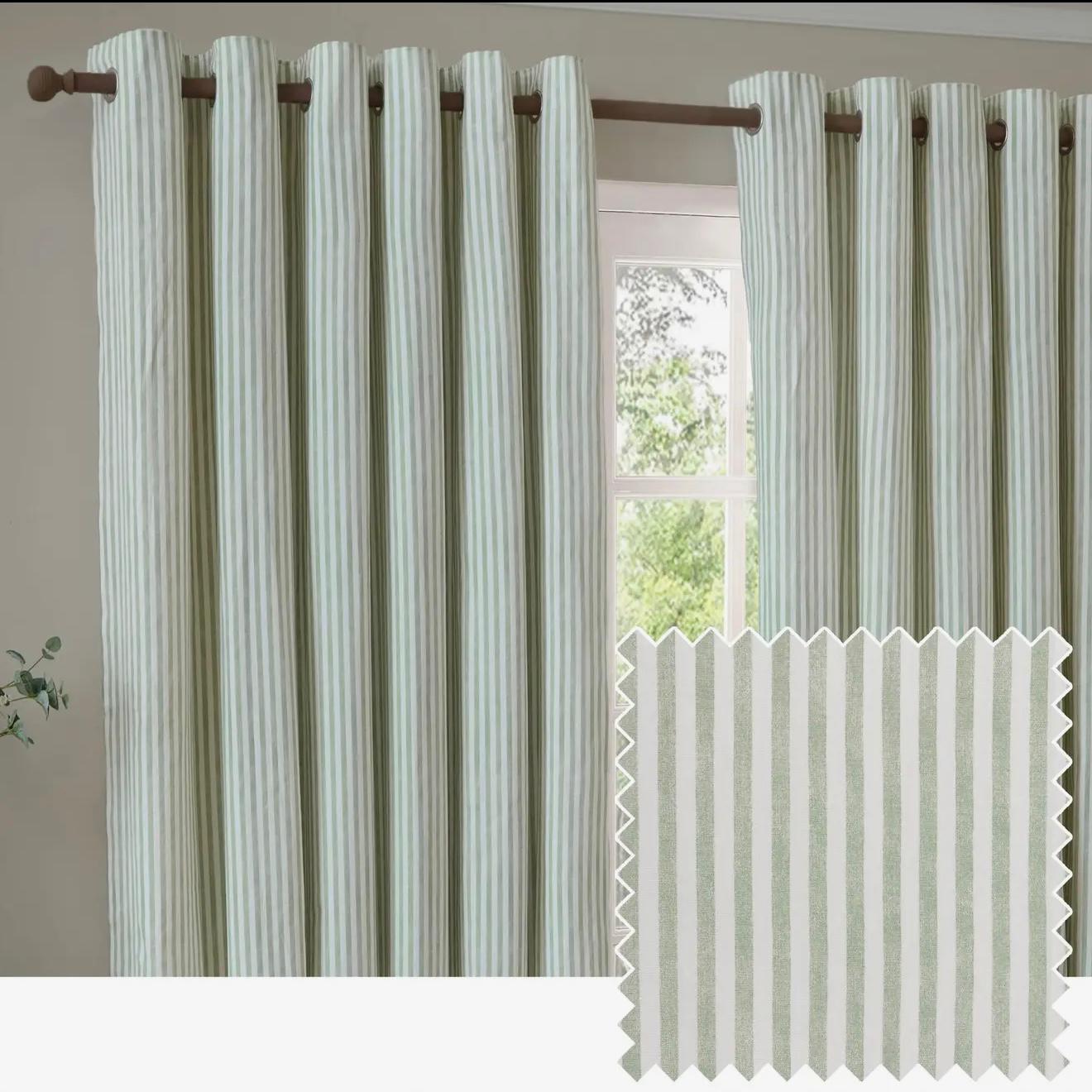 Sage green and black striped blackout eyelet curtains by Riva Home, soft furnishings with elegant design and eyelet top for window decor.