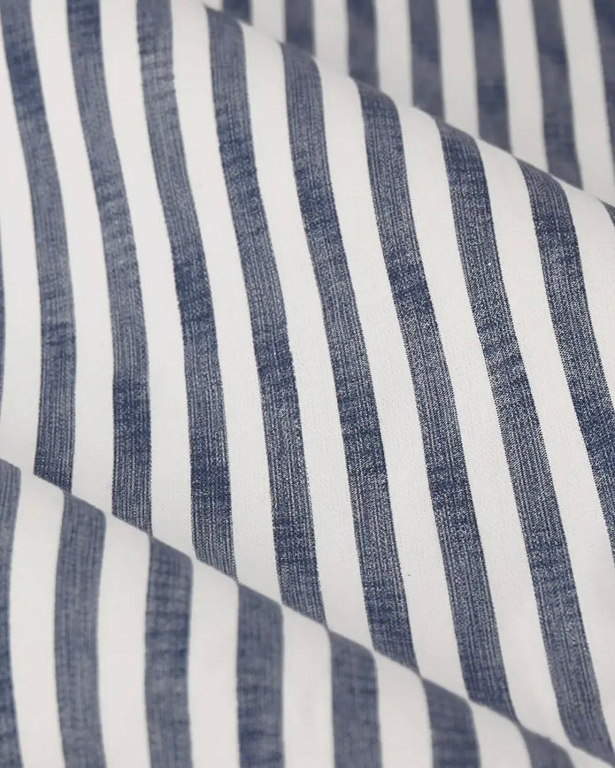 Navy blue striped blackout eyelet curtains from Riva Home, soft furnishings with black and navy pattern and eyelet top design.